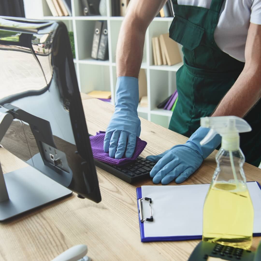 image of people cleaning an office