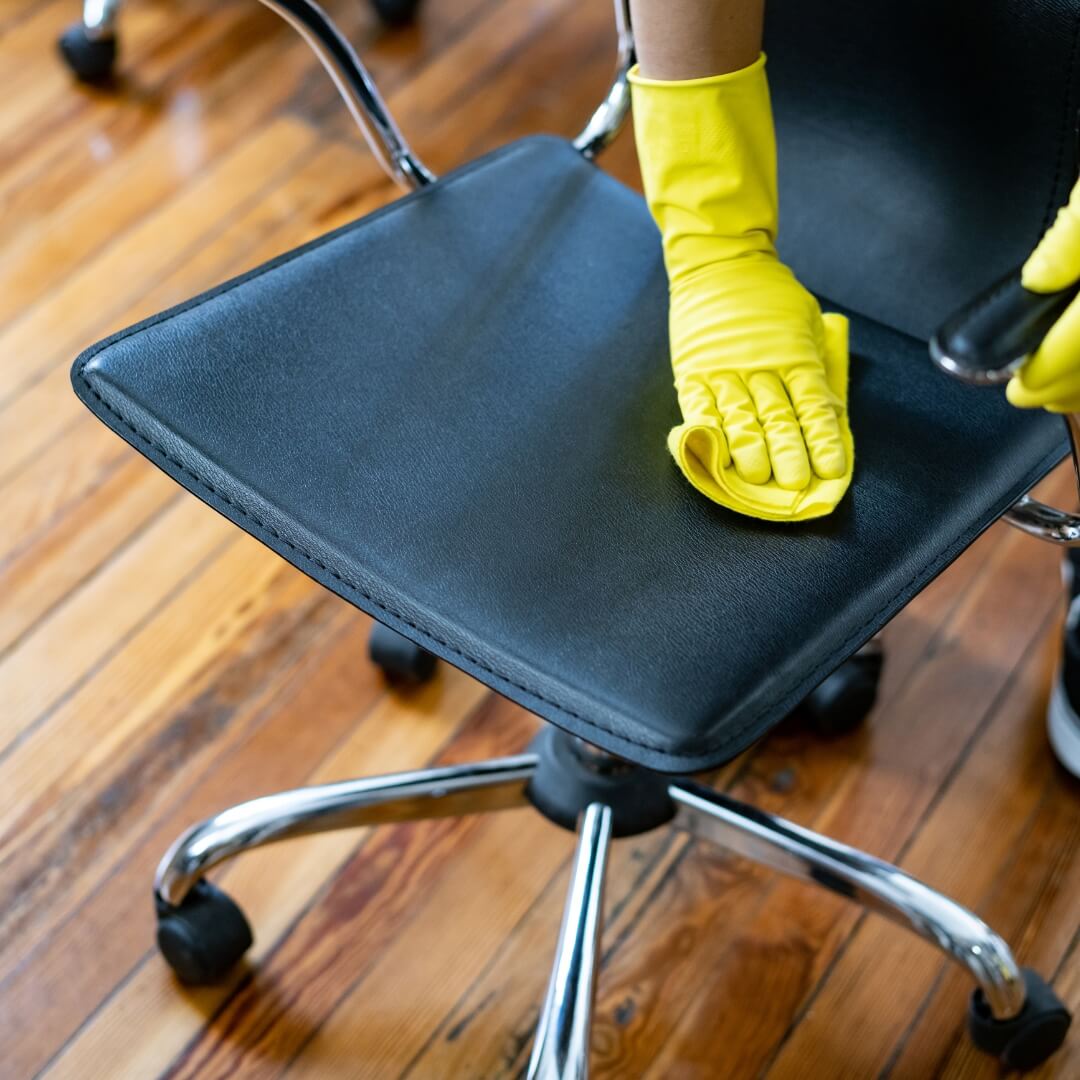 image of an office chair being cleaned