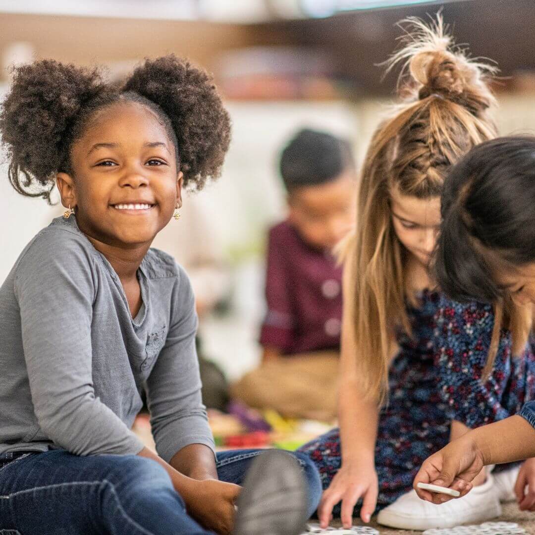 student smiling in classroom