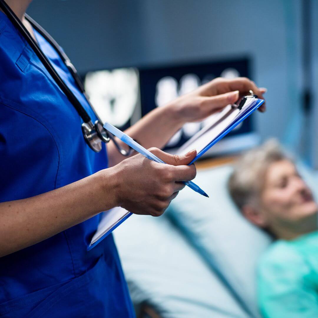 hospital staff with patient