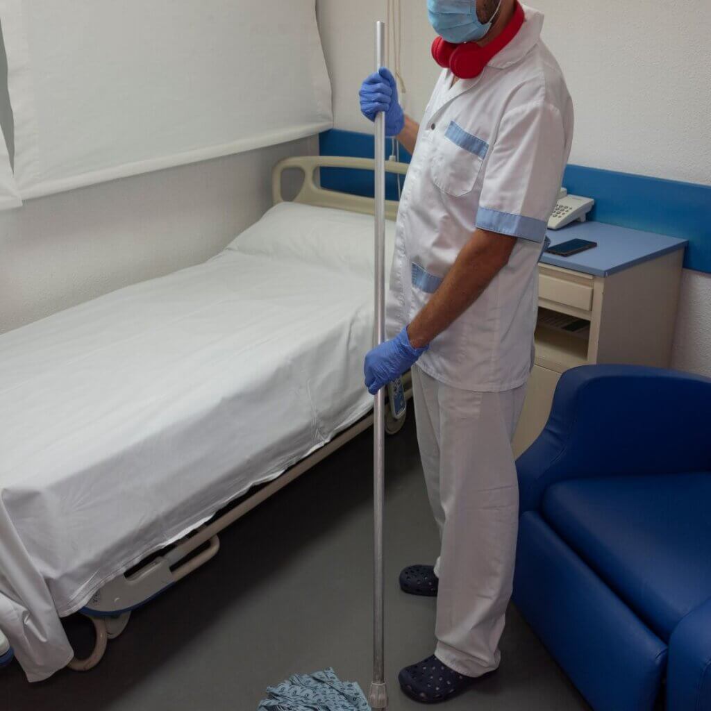 An expert cleaning a medical facility