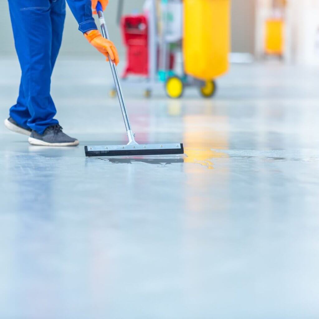 A person mopping the floor 