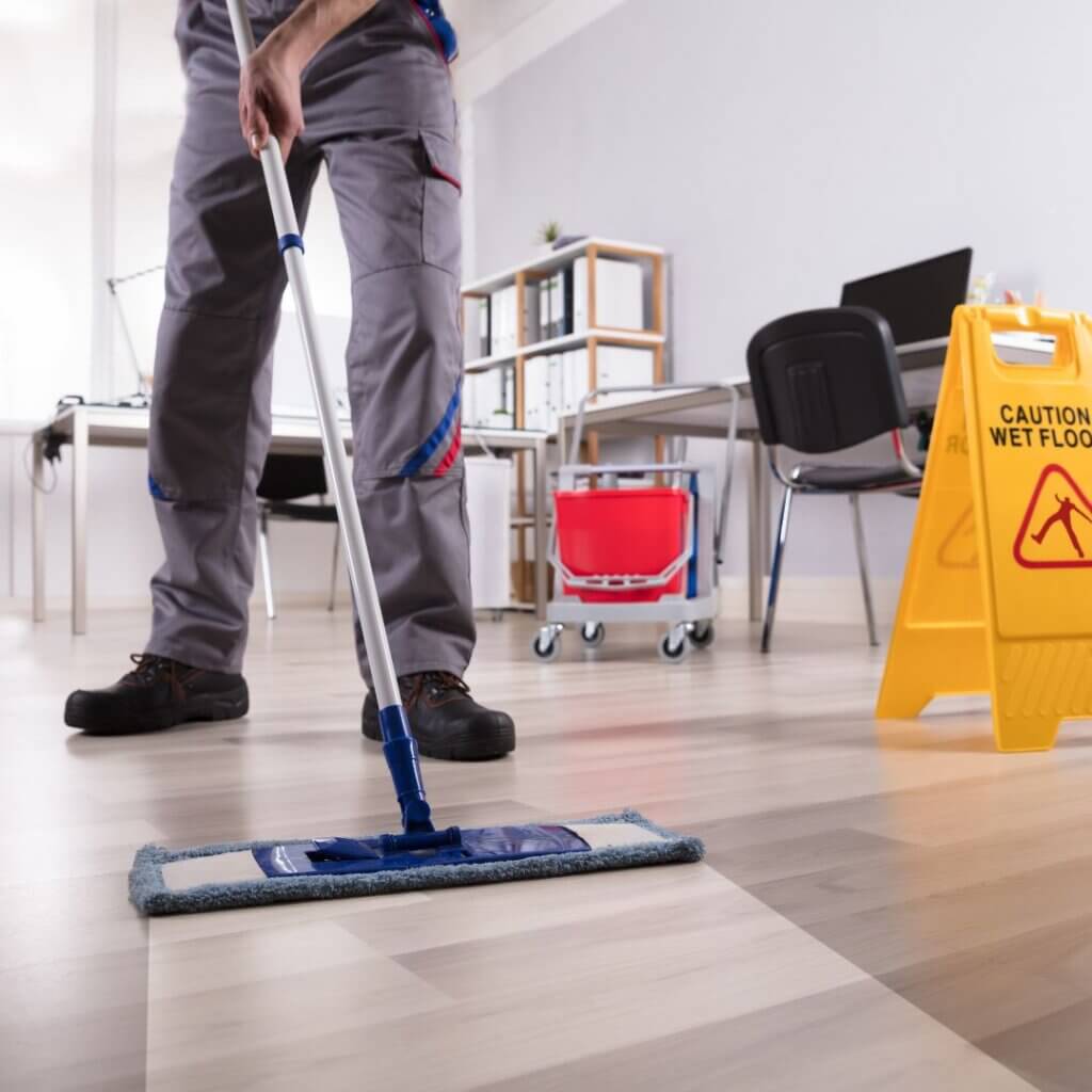 A person sweeping the floor