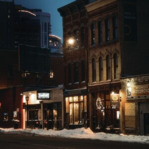 A storefront exterior at night.